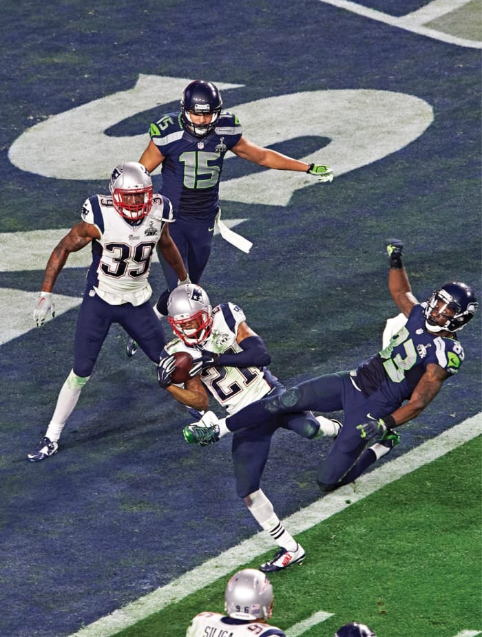 SEATTLE SETTLED The Malcolm Butler pick (top) in XLIX was the last pass the Seahawks threw in a Super Bowl, but Wilson and Carroll (below) have returned to the playoffs five times since.